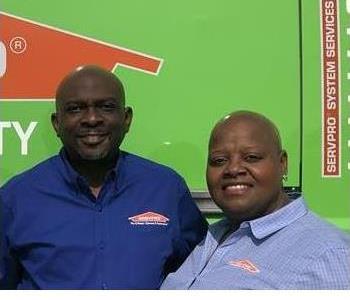 Owners of SERVPRO of Platte County in blue shirt